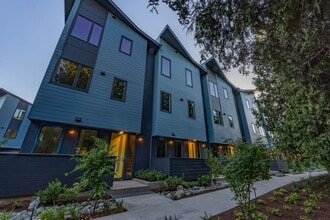 Building Photo - Riverside Townhomes - Waterfront Living in...