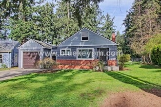 Building Photo - 4 Bedroom, 2 Bath Home with Primary on Main Floor, Basement and Large Fenced Yard