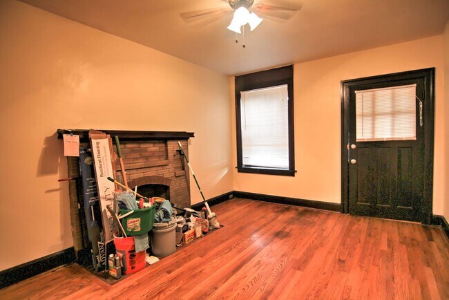 Building Photo - This 2 bedroom 1 bath home has been completely refinished with brilliant hardwood floors throughout!