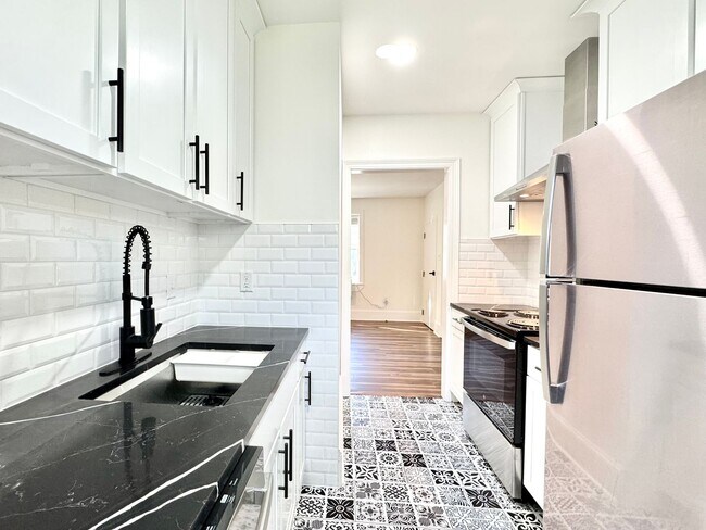 Building Photo - The Gladiola – Newly Renovated Luxury Living Near LSU Lakes