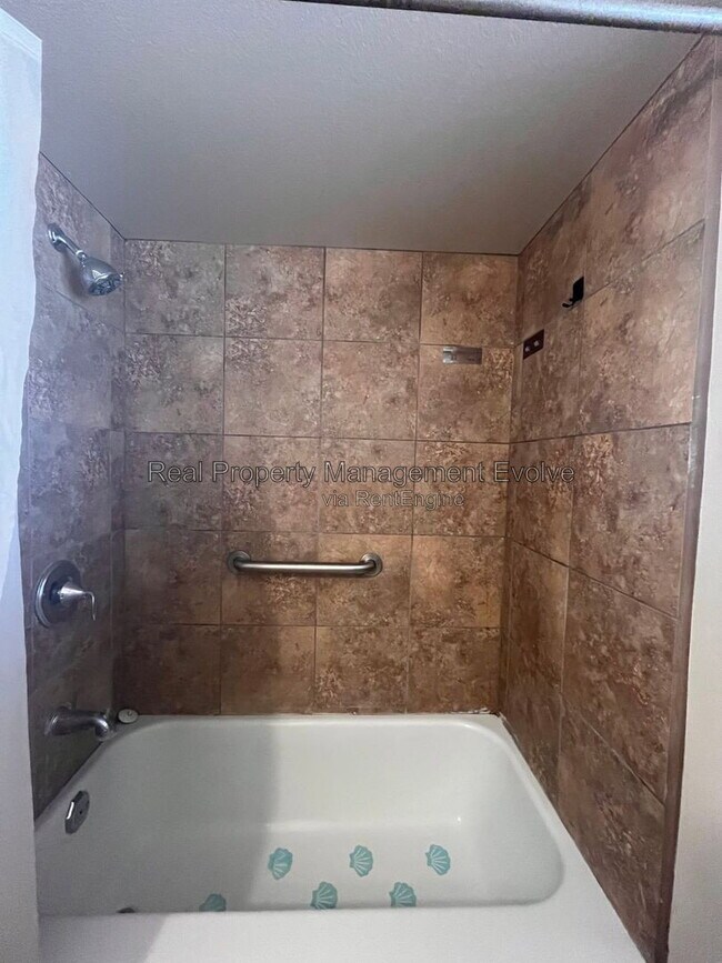 Building Photo - 12076 N Pebble Beach Dr