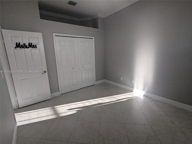 Building Photo - Northwest 91st Court, Hialeah Gardens, FL 33018 - 3 BR 1 BA single-family home