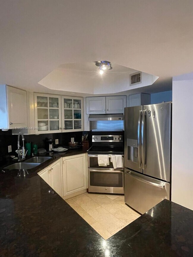 Building Photo - 8911 Collins Ave