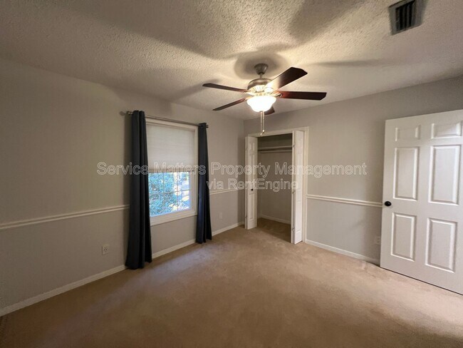 Building Photo - 6004 Players Pl