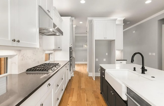 Building Photo - Stunning Bethany Farmhouse with Chef’s Kitchen, Media Room, Main-Level Suite & Luxury Designer Fi...