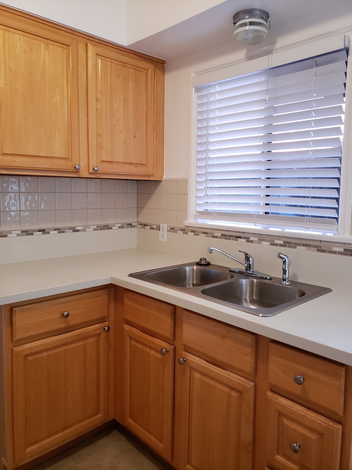 QUARTZ COUNTER TOPS / SOLID WOOD CABINETS - 305 N Palm Ave