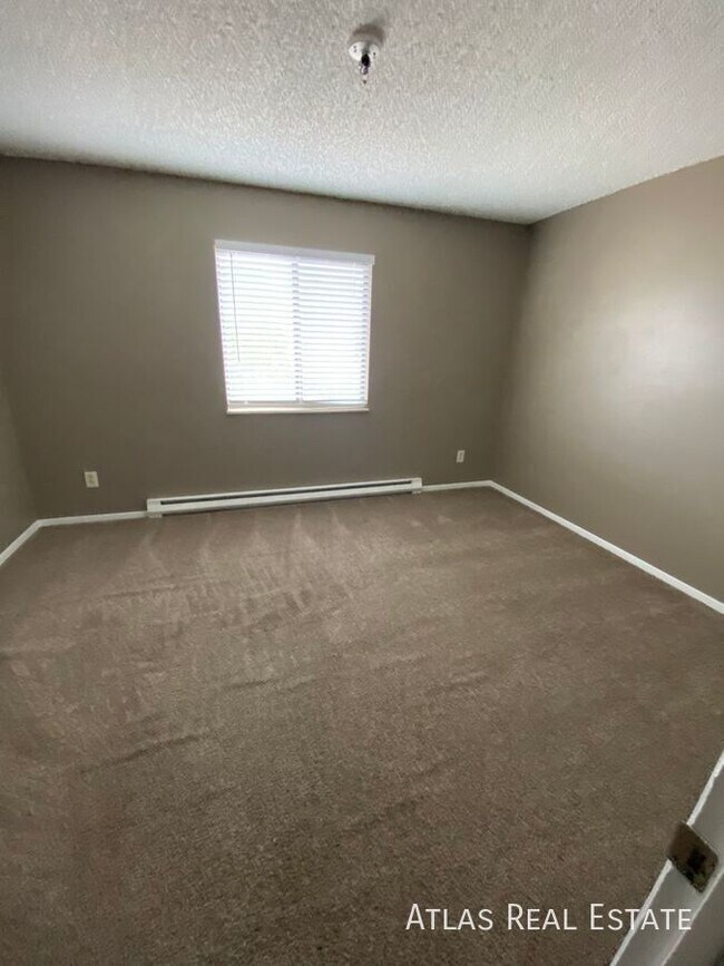 Building Photo - COMING SOON! *Affordable & Centrally Locat...