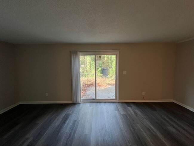 Building Photo - Beautiful Townhome with New LVP Floors and...