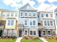 Building Photo - Beautiful Luxury 3 Story 3 Bedroom Townhome with 1st Floor Guest Suite, Attached 2 Car Garage, Co...