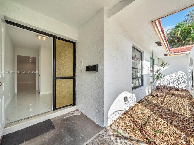 Building Photo - 10251 NW 39th Ct