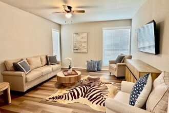 Two Bedroom, Two Bathroom Living Room - Midtown Apartments