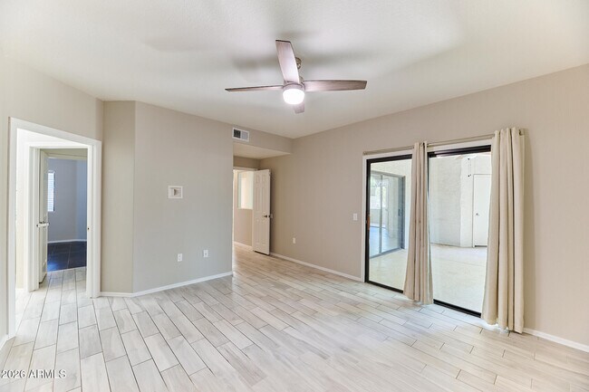 Building Photo - 9555 E Raintree Dr