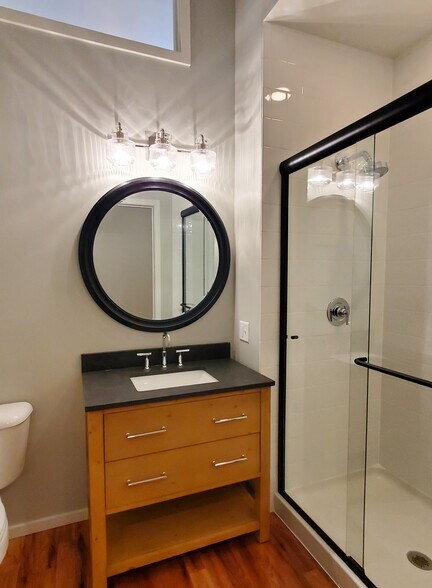 Blue limestone countertop & Kohler fixtures - 128 E High St