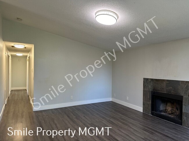 Building Photo - A charming three-bedroom & two-bathroom house.