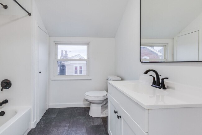 Building Photo - AVAILABLE JUNE 2026! - 2 Bedroom Suburban Vibes in the HEART of the City!!