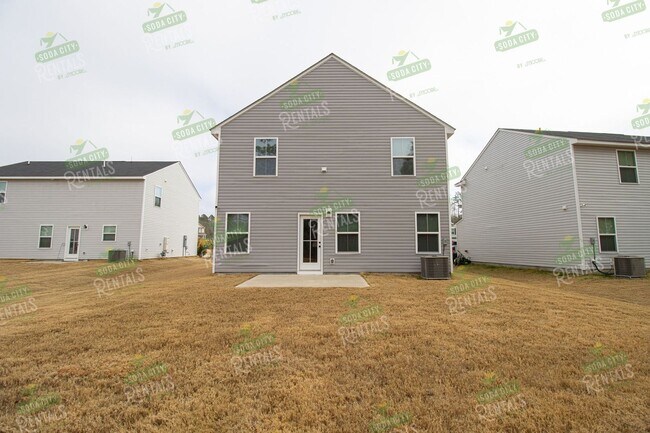 Building Photo - Modern 4 Bedroom Home ~ Minutes to Fort Jackson ~ Available May 2026!