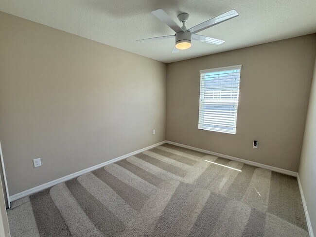 Building Photo - Spacious 4-Bedroom Retreat with additional office/den in the Heart of Trinity!