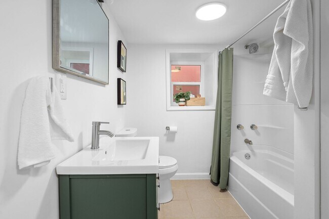 Building Photo - $1795 - Single Family Home with Private Two-Level Living Spaces, Driveway Parking & Modern Updates