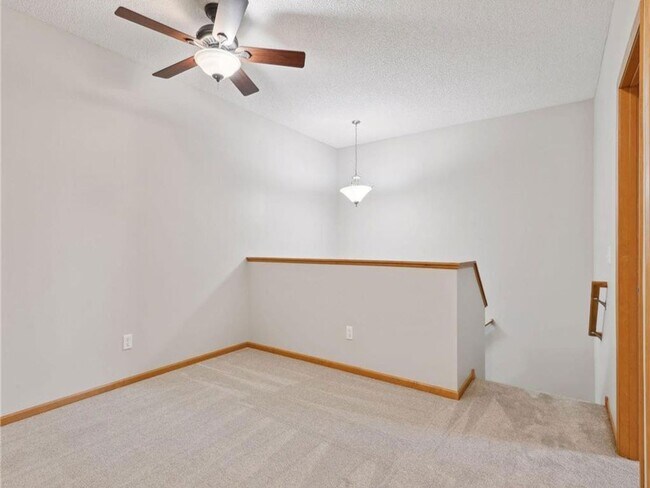 Building Photo - Upscale Townhome with Large Office-Loft, 3 Baths, 2-Car Attached Garage, Quartz Countertops and M...