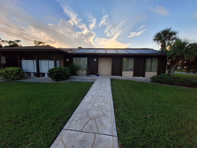 Building Photo - Second Floor Annual rental available now in the 55+ condominium community of Cedar Woods.