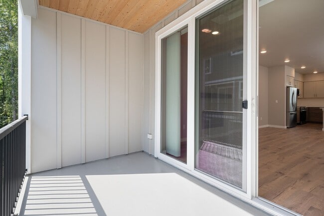 Building Photo - NEW CONSTRUCTION – Stylish 4-Bedroom Townh...