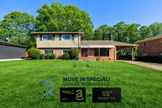 Building Photo - Move in before February 15th and choose your reward: a $250 Amazon Gift Card or a 55" Smart TV!