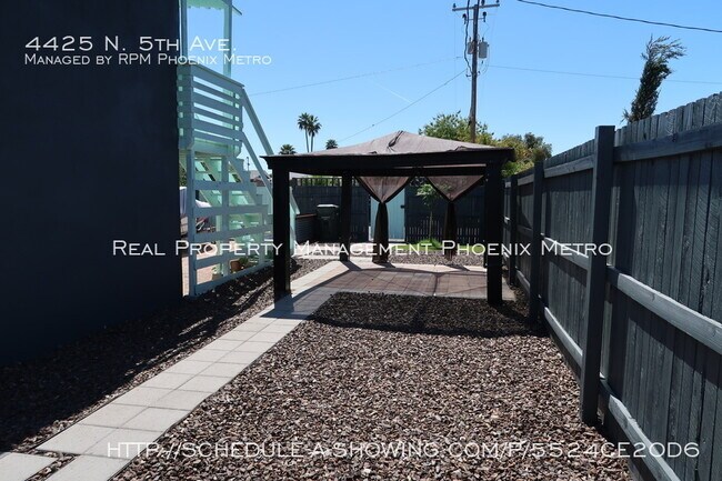 Building Photo - UPTOWN HOME WITH PRIVATE YARD!