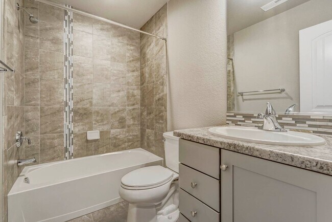 Building Photo - Modern 4BR with Open Kitchen, Patio & 2-Car Garage