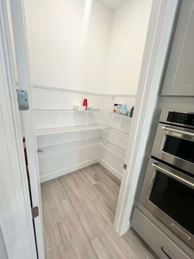 Building Photo - STUNNING LAKEFRONT 3 BEDROOM, 2.5 BATH HOM...