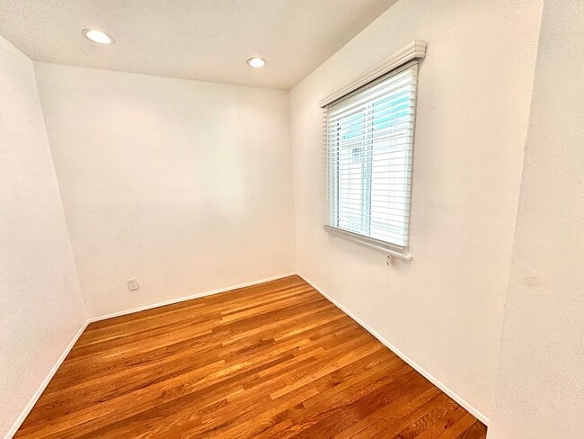 Building Photo - An apartment with character! Hardwood floo...