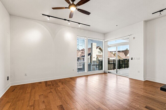 Building Photo - Fantastic Condo With Central AC And 1 Reserved Garage Parking Space!