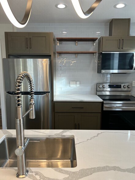 Stainless Steel Famhouse faucet - 4022 NE Mallory Ave