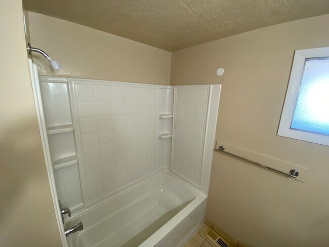 Building Photo - Spacious 2-Bedroom Home in Roy! $350 Off o...