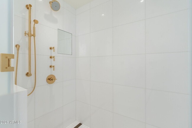 Building Photo - 6587 N Palmeraie Blvd