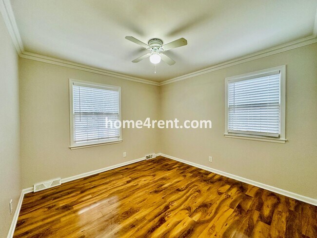 Building Photo - A Lovely Four Bedroom Home in Lenexa w/ Wood Floors, Finished Basement and a Fenced Yard!