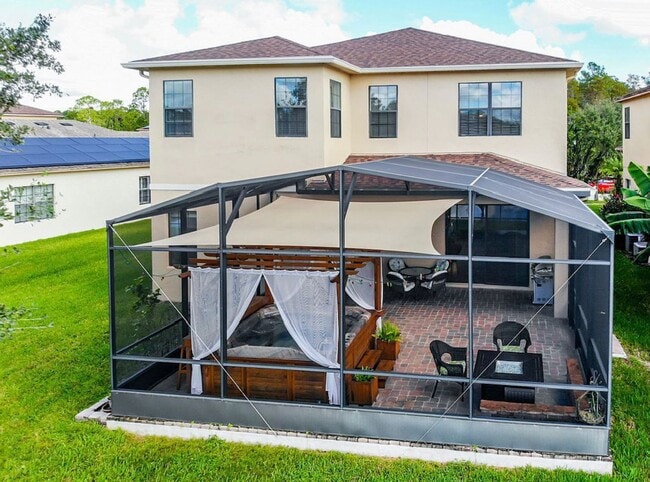 Building Photo - Luxury Living in Woodland Lakes Preserve: Fully-Furnished