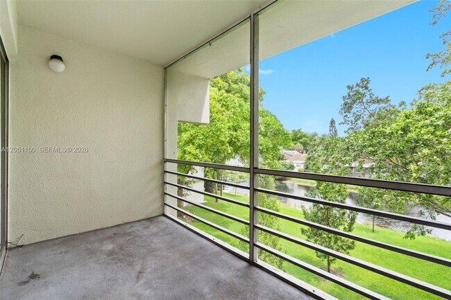 Building Photo - 4215 N University Dr