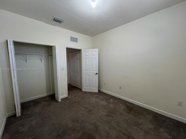 Building Photo - 11066 W 33rd Ln