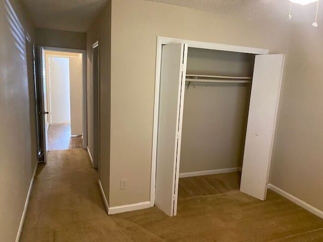 Building Photo - NOW AVAILABLE! Charming 2-Bedroom, 2-Bathroom Single-Level Townhome