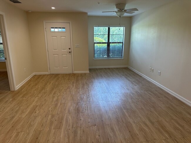 Building Photo - Experience Maintenance-Free 55+ Living at The Cove at Tavares Village!