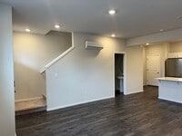 Building Photo - Gorgeous 2 Bedroom Townhome with 2 Car Gar...
