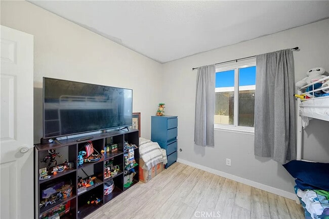 Building Photo - Bright 2-Bed Condo with Central Air, Pool Access & Carport in Anaheim