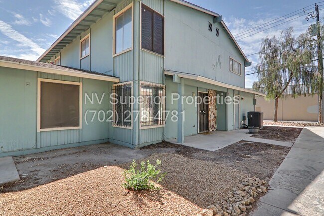 Building Photo - SE!! Close to UNLV!! 2 Bedroom 2 story!! 1 Car Carport!! Fully Furnished!! Community Pool!! and T...
