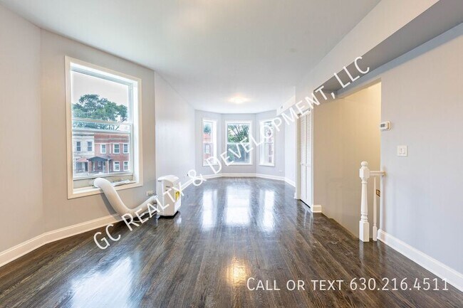 Building Photo - 6433 S Vernon Ave