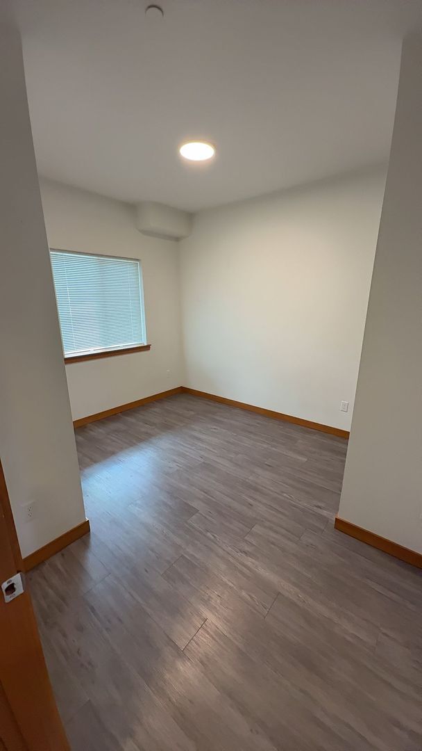 Building Photo - 1200/1210 Billy Frank Jr St - 1210 #103 Room 2 (Rooming Unit)