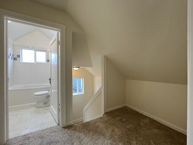 Building Photo - Character-Filled Concordia Home with Flexible Living Spaces & Gas Fireplace