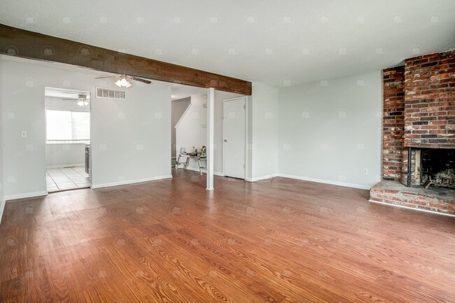 Building Photo - **Spacious 3-Bedroom Townhome with Partial...