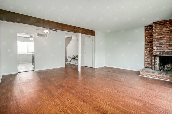 Building Photo - **Spacious 3-Bedroom Townhome with Partially Finished Basement and Off-Street Parking**