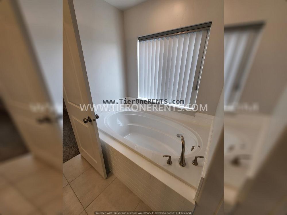 Building Photo - This property offers a NO DEPOSIT option available for qualified renters!