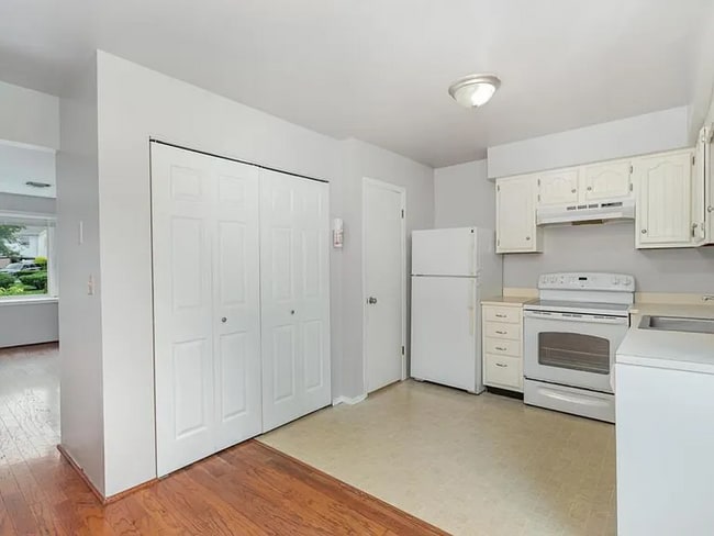 Building Photo - This charming house offers a cozy and comfortable living space.